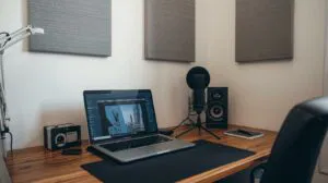 Home recording setup for voice overs with basic microphone and untreated room
